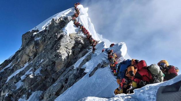 Photos of long queues near the summit have been widely shared as record numbers ascended the mountain in May. (AFP Photo) Photos of long queues near the summit have been widely shared as record numbers ascended the mountain in May. (AFP Photo)