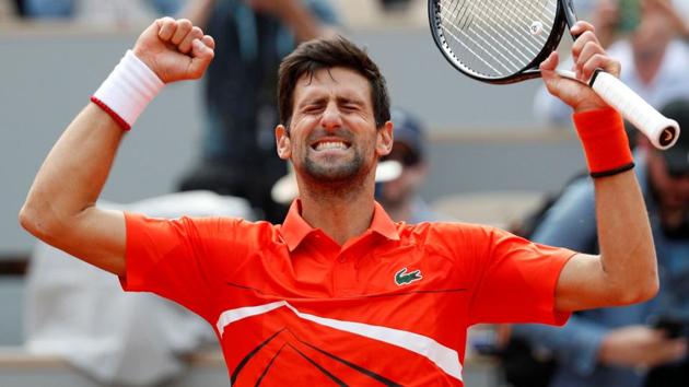 Novak Djokovic celebrates after winning his first round match against Poland's Hubert Hurkacz in the French Open.(Reuters)