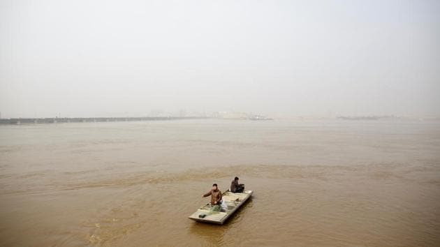 Fishermen Sun Lianxi, 32, and Sun Genxi, 44, travel down the Yellow River to cast their net on the northern outskirts of Zhengzhou. For generations, the Suns plied their fishing boats up and down the Huai and Yellow Rivers, living off their daily catch. Like their grandfather and father before them, brothers Sun Genxi and Sun Lianxi were born on a fishing boat. (Thomas Peter / REUTERS) Fishermen Sun Lianxi, 32, and Sun Genxi, 44, travel down the Yellow River to cast their net on the northern outskirts of Zhengzhou. For generations, the Suns plied their fishing boats up and down the Huai and Yellow Rivers, living off their daily catch. Like their grandfather and father before them, brothers Sun Genxi and Sun Lianxi were born on a fishing boat. (Thomas Peter / REUTERS)