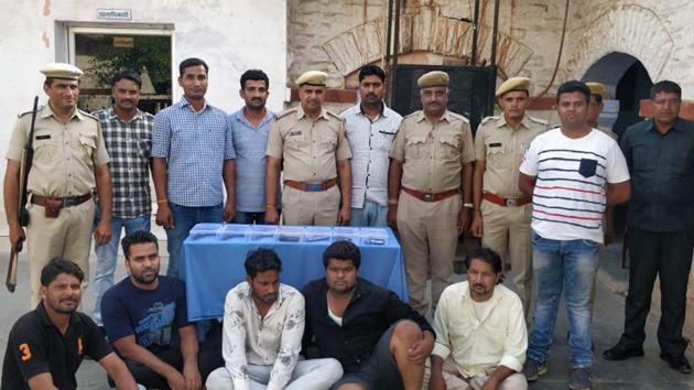 Five accused in custody of Chittorgarh police who were arrested on Saturday with seven illegal firearms. (HT Photo) Five accused in custody of Chittorgarh police who were arrested on Saturday with seven illegal firearms. (HT Photo)