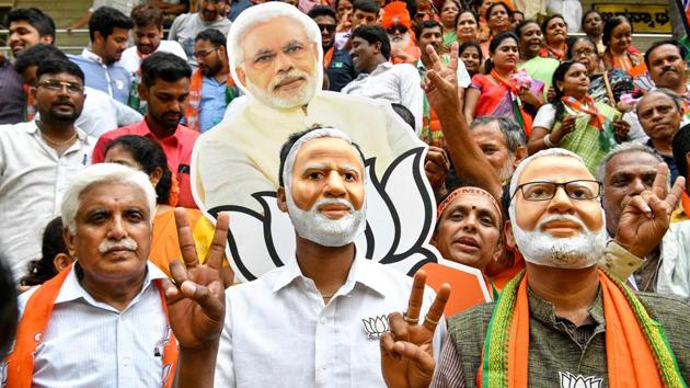 Modi supporters celebrate the BJP’s victory, Bengaluru, May 23. In Karnataka and Telangana, the BJP’s vote share improved by 8.01 and 8.5 percentage points respectively(AFP)