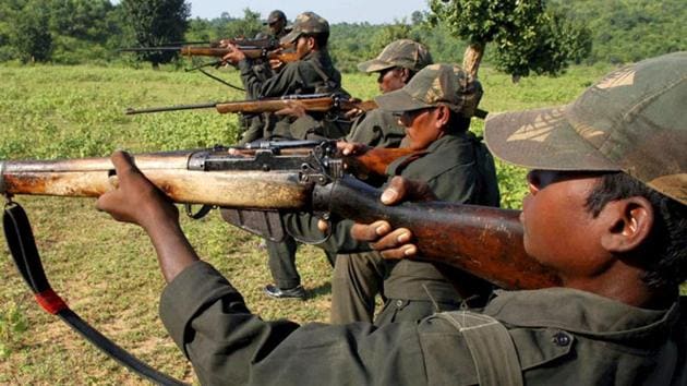 Maoist rebels train in a forest area in Bihar's Gaya district.(AP)