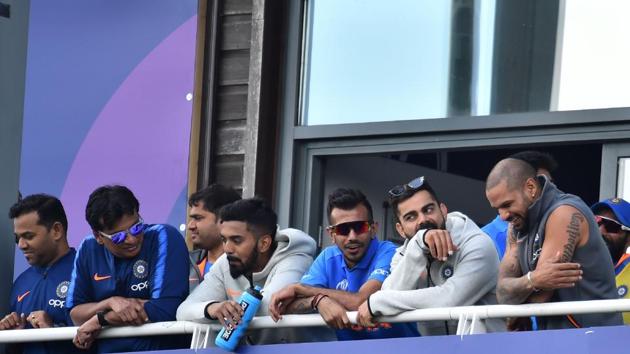 India's captain Virat Kohli (2R) looks on as India's Mahendra Singh Dhoni approaches his century during the 2019 Cricket World Cup warm up match between Bangladesh v India at Sophia Gardens stadium in Cardiff(AFP)