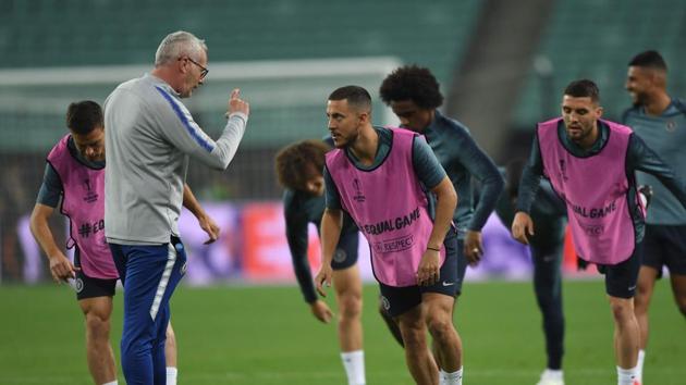 Chelsea's Belgian midfielder Eden Hazard (C) speaks with assistant coach Massimo Nenci during a training session at the Baku Olympic Stadium in Baku on May 28, 2019 on the eve of the UEFA Europa League final football match between Chelsea and Arsenal. (AFP) Chelsea's Belgian midfielder Eden Hazard (C) speaks with assistant coach Massimo Nenci during a training session at the Baku Olympic Stadium in Baku on May 28, 2019 on the eve of the UEFA Europa League final football match between Chelsea and Arsenal. (AFP)