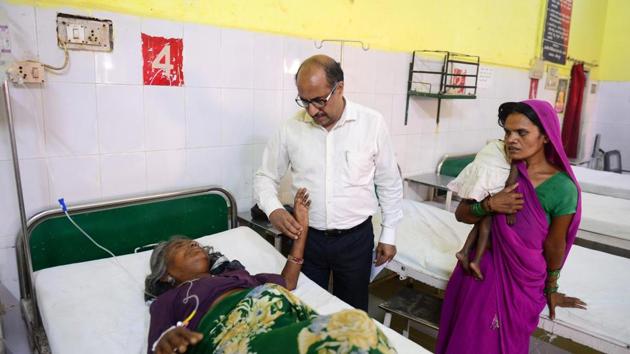 Chief medical officer Doctor Anil Agarwal (C) during his inspection round in a hospital at Sitapur, Uttar Pradesh. “This scheme has infused a sense of belief in the poor that if they fall sick they will get treatment without spending a rupee,” Agarwal said. Voting data from the election that ended last week showed particularly strong support for Modi’s BJP in poorer areas where people would have benefited most. (Sanjay Kanojia / AFP) Chief medical officer Doctor Anil Agarwal (C) during his inspection round in a hospital at Sitapur, Uttar Pradesh. “This scheme has infused a sense of belief in the poor that if they fall sick they will get treatment without spending a rupee,” Agarwal said. Voting data from the election that ended last week showed particularly strong support for Modi’s BJP in poorer areas where people would have benefited most. (Sanjay Kanojia / AFP)
