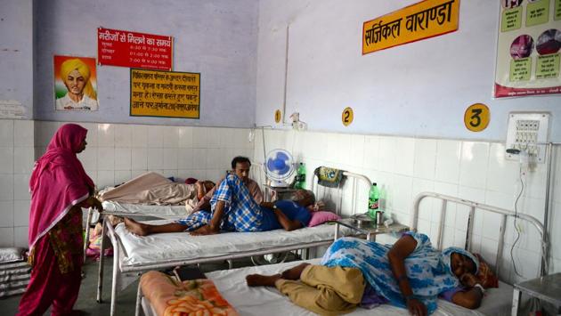 Patients rest on beds in a hospital at Sitapur district. But the family of Vindeshwari Devi, who has had her uterus removed at the same Sitapur hospital, is satisfied. “I think this scheme is good and it will only get better,” said Sunil Kumar, a daily-wage labourer and Devi’s son-in-law. “For those who have nothing, it means a lot.” (Sanjay Kanojia / AFP) Patients rest on beds in a hospital at Sitapur district. But the family of Vindeshwari Devi, who has had her uterus removed at the same Sitapur hospital, is satisfied. “I think this scheme is good and it will only get better,” said Sunil Kumar, a daily-wage labourer and Devi’s son-in-law. “For those who have nothing, it means a lot.” (Sanjay Kanojia / AFP)