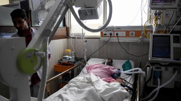 A patient in bed on a ventilator in Gurgaon. Modi’s second term, however, will have to iron out some of the scheme’s teething problems. “We can’t cope with (receiving) 9,000 rupees for a caesarean section which would include stay of the patient, fees of the anaesthetist, paediatrician, medicines and so on,” said Doctor V.K. Monga from the Indian Medical Association. “But corrective steps are being taken, ” he added. (Money Sharma / AFP) A patient in bed on a ventilator in Gurgaon. Modi’s second term, however, will have to iron out some of the scheme’s teething problems. “We can’t cope with (receiving) 9,000 rupees for a caesarean section which would include stay of the patient, fees of the anaesthetist, paediatrician, medicines and so on,” said Doctor V.K. Monga from the Indian Medical Association. “But corrective steps are being taken, ” he added. (Money Sharma / AFP)