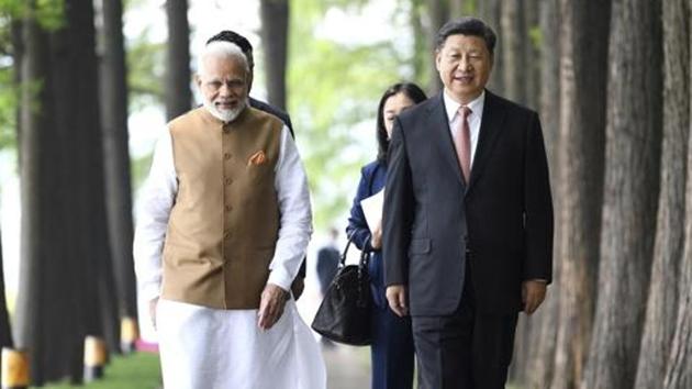 During the first informal summit between the two leaders in the Chinese city of Wuhan in April, last year, Xi had accepted PM Modi’s invitation to visit India for the next informal summit in 2019.(AP/ File photo) During the first informal summit between the two leaders in the Chinese city of Wuhan in April, last year, Xi had accepted PM Modi’s invitation to visit India for the next informal summit in 2019.(AP/ File photo)