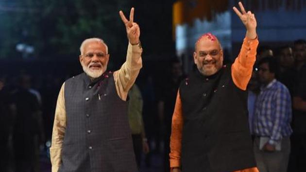 Narendra Modi and president of the ruling Bharatiya Janata Party (BJP) Amit Shah celebrate the victory in Lok Sabha elections 2019.(AFP)