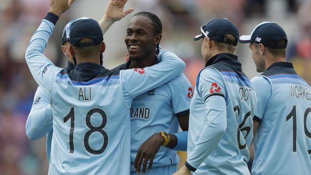 England's Jofra Archer, second left, celebrates taking the wicket of South Africa's Rassie van der Dussen in the ICC World Cup opener. (AP)