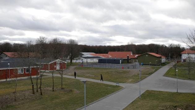 Residents walk through the common grounds area at Kaershovedgaard. The latest available data from the Danish Ministry of Immigration showed that in 2017 35% of asylum seekers were granted asylum, down from 72% and 85% in 2016 and 2015, respectively. The number of asylum seekers peaked in 2015 at over 21,000 and dropped to 3,500 in 2017, as a result of Denmark’s tougher laws. (Andrew Kelly / REUTERS) Residents walk through the common grounds area at Kaershovedgaard. The latest available data from the Danish Ministry of Immigration showed that in 2017 35% of asylum seekers were granted asylum, down from 72% and 85% in 2016 and 2015, respectively. The number of asylum seekers peaked in 2015 at over 21,000 and dropped to 3,500 in 2017, as a result of Denmark’s tougher laws. (Andrew Kelly / REUTERS)