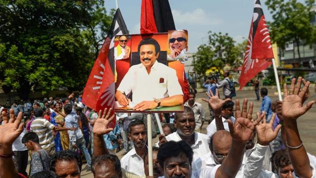 Indian members of the Dravida Munnetra Kazhagam (DMK) shout slogans and hold the portrait of party president MK Stalin as they celebrate on the results day for India's general election in Chennai on May 23, 2019. Stalin has emerged numero uno in a state after the passing away of the two iconic stalwarts, M Karunanidhi, J Jayalalithaa(AFP)