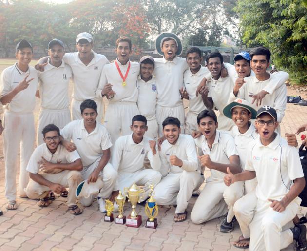 Team Deccan Gymkhana with their trophy after winning the Shivrampant Vishnu Damle under-19 inter-club cricket at the Katariya High School ground on Friday.(SHANKAR NARAYAN/HT PHOTO)