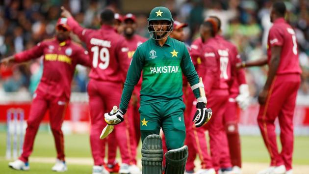 Pakistan's Hasan Ali looks dejected as he walks off after losing his wicket. (Action Images via Reuters) 