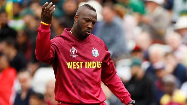 West Indies' Andre Russell signals for treatment. (Action Images via Reuters) 