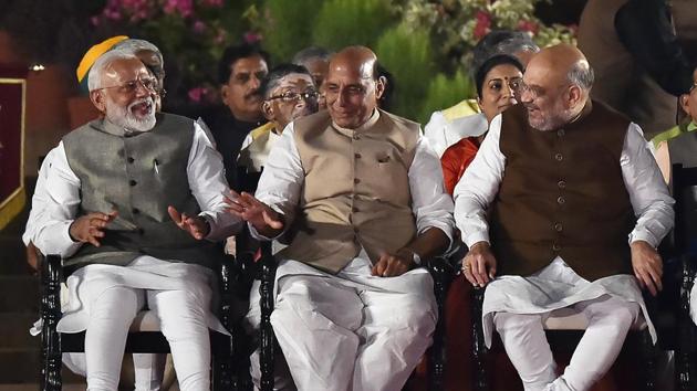 Amit Shah, whose inclusion in the cabinet was administered the oaths after Modi and Rajnath Singh, indicating the order of seniority in the new government, which took office exactly a week after results from the 17th general elections were declared. Singh will continue to enjoy the number two status in the Modi government, which means he chairs the meeting of the cabinet in the absence of the prime minister. (Ajay Aggarwal / HT Photo) Amit Shah, whose inclusion in the cabinet was administered the oaths after Modi and Rajnath Singh, indicating the order of seniority in the new government, which took office exactly a week after results from the 17th general elections were declared. Singh will continue to enjoy the number two status in the Modi government, which means he chairs the meeting of the cabinet in the absence of the prime minister. (Ajay Aggarwal / HT Photo)