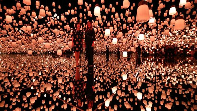 US first lady Melania Trump and Akie Abe, wife of Japanese Prime Minister Shinzo Abe, tour the teamLab Borderless exhibit at the MORI Building Digital Art Museum in Tokyo, Japan. (Athit Perawongmetha / REUTERS)