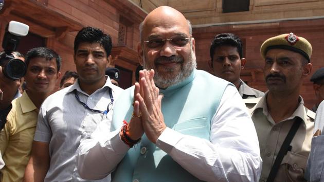 Amit Shah took charge as Minister of Home Affairs in newly-elected Prime Minister Narendra Modi's cabinet, at North Block in New Delhi on Saturday. (Sonu Mehta/HT PHOTO) Amit Shah took charge as Minister of Home Affairs in newly-elected Prime Minister Narendra Modi's cabinet, at North Block in New Delhi on Saturday. (Sonu Mehta/HT PHOTO)