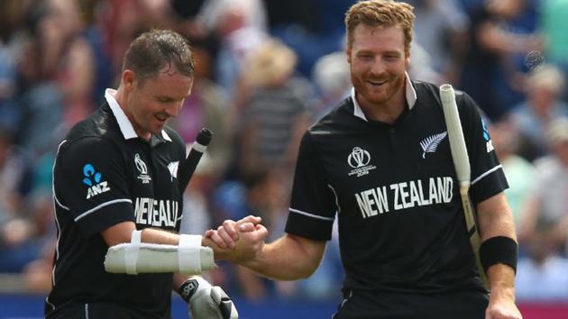 New Zealand's Colin Munro (L) celebrates with teammate New Zealand's Martin Guptill after victory.(AFP)
