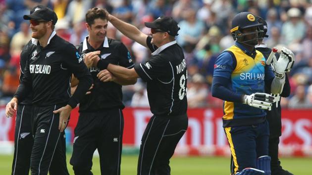 New Zealand's Colin de Grandhomme (2L) celebrates with teammates including New Zealand's Martin Guptill (L). (AFP) New Zealand's Colin de Grandhomme (2L) celebrates with teammates including New Zealand's Martin Guptill (L). (AFP)