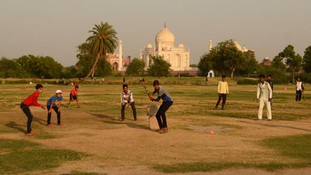 An Afternoon cricket match at a park with the Taj Mahal in the backdrop in Agra, Uttar Pradesh. (Pawan Sharma / AFP) An Afternoon cricket match at a park with the Taj Mahal in the backdrop in Agra, Uttar Pradesh. (Pawan Sharma / AFP)