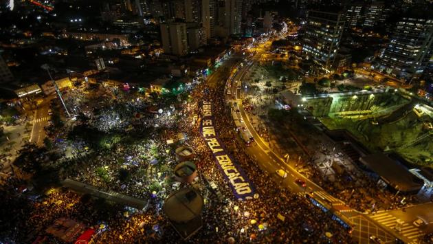 A demonstration in support and defence of public education following a raft of budget cuts announced by President Jair Bolsonaro’s government, in Sao Paulo, Brazil. (Miguel Schincariol / AFP)