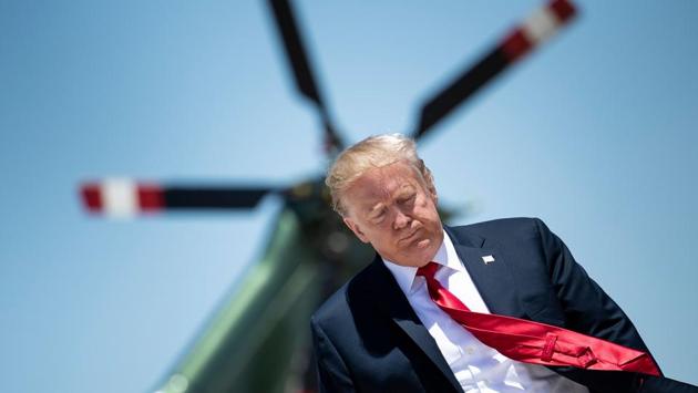 US President Donald Trump arrives at Joint Base Andrews in Maryland to board Air Force One. before travelling to Japan for a three-day official visit. (Brendan Smialowski / AFP)