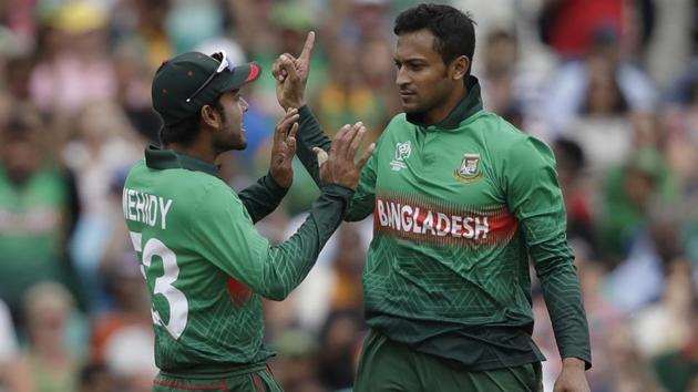 Bangladesh's Shakib Al Hasan, right, celebrates taking the wicket of South Africa's Aiden Markram. (AP)
