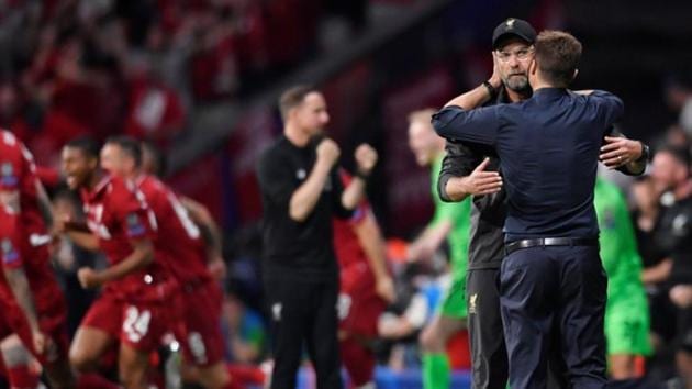 Soccer Football - Champions League Final - Tottenham Hotspur v Liverpool - Wanda Metropolitano, Madrid, Spain - June 1, 2019 Liverpool manager Juergen Klopp and Tottenham manager Mauricio Pochettino embrace after the match. REUTERS/Toby Melville(REUTERS)