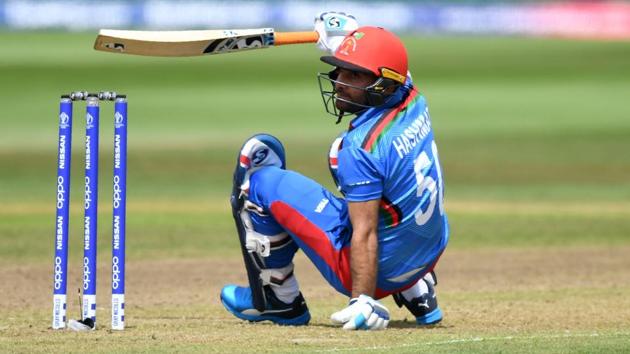 Afghanistan's Hashmatullah Shahidi takes a tumble. (AFP)