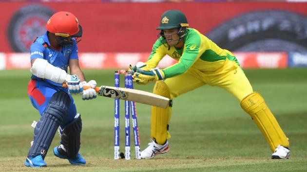Afghanistan's Hashmatullah Shahidi (L) is stumped by Australia's Alex Carey for 18. (AFP)