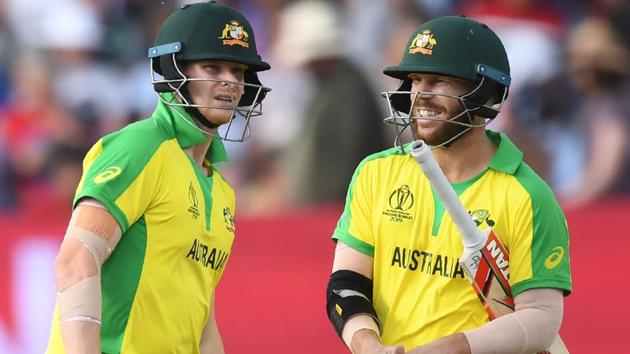 Australia's David Warner (R) and Australia's Steve Smith discuss.(AFP)