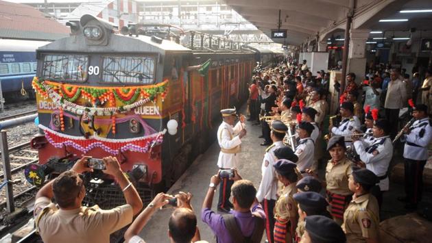 People celebrate the Pune-Mumbai Deccan Queen’s 90th year in service at Pune railway station in Pune on June 1. The introduction of ‘’Deccan Queen’’ between the two premier cities of Maharashtra on 1st June 1930 was a major landmark in the history of the Great Indian Peninsula (GIP) Railway, the forerunner of the Central Railway. (HT Photo)