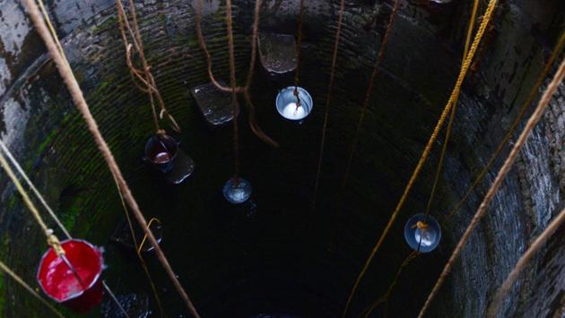Buckets are lowered down into a well in the outskirts of Chennai, Tamil Nadu. Water levels in the four main reservoirs at Chennai have fallen to one of their lowest levels in 70 years. (Arun Sankar / AFP) Buckets are lowered down into a well in the outskirts of Chennai, Tamil Nadu. Water levels in the four main reservoirs at Chennai have fallen to one of their lowest levels in 70 years. (Arun Sankar / AFP)