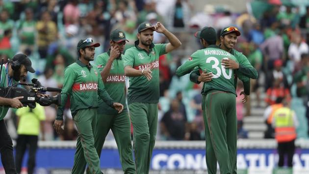 Bangladesh's captain Mashrafe Mortaza, centre, celebrates with his teammates as they walk off after winning by 21 runs in the Cricket World Cup match between South Africa and Bangladesh at the Oval in London, Sunday, June 2, 2019.(AP)