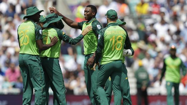 South Africa's Lungi Ngidi, centre, celebrates taking the wicket of England's Jos Buttler during the World Cup cricket match between England and South Africa at The Oval in London, Thursday, May 30, 2019(AP)