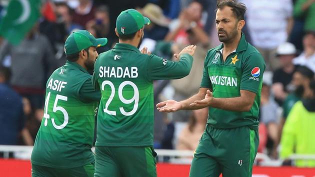 Pakistan's Wahab Riaz (R) celebrates with teammates after taking the wicket of England's Chris Woakes. (AFP) Pakistan's Wahab Riaz (R) celebrates with teammates after taking the wicket of England's Chris Woakes. (AFP)