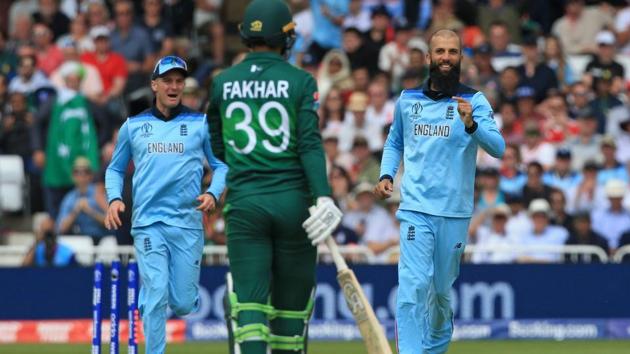 England's Moeen Ali (R) smiles after Pakistan's Fakhar Zaman (C) is stumped. (AFP)