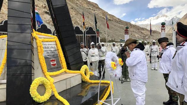 Defence Minister Rajnath Singh pays tribute to martyred soldiers, in Siachen. Less than 48 hours after taking office, Rajnath Singh visited the Siachen glacier and interacted with soldiers deployed on the world’s highest battlefield, his first outstation visit in the role. Army chief General Bipin Rawat also accompanied Singh. (PTI) Defence Minister Rajnath Singh pays tribute to martyred soldiers, in Siachen. Less than 48 hours after taking office, Rajnath Singh visited the Siachen glacier and interacted with soldiers deployed on the world’s highest battlefield, his first outstation visit in the role. Army chief General Bipin Rawat also accompanied Singh. (PTI)