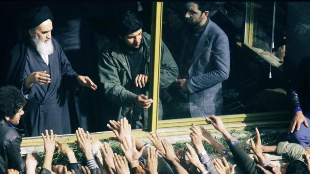 Crowds greet Ayatollah Khomeini (L) in Tehran, after his return from exile in France on February 2, 1979. Born in 1902, Khomeini died on 3 June 1989 following a battle with cancer just over 10 years after he led the Islamic revolution that swept Iran’s last shah Mohammad Reza Pahlavi from power. (Gabriel Duval / AFP File) Crowds greet Ayatollah Khomeini (L) in Tehran, after his return from exile in France on February 2, 1979. Born in 1902, Khomeini died on 3 June 1989 following a battle with cancer just over 10 years after he led the Islamic revolution that swept Iran’s last shah Mohammad Reza Pahlavi from power. (Gabriel Duval / AFP File)