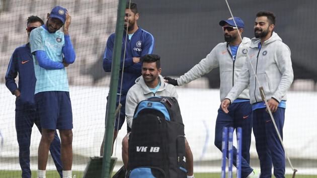 India's captain Virat Kohli, right, spends time with his teammates in the nets. (AP) India's captain Virat Kohli, right, spends time with his teammates in the nets. (AP)