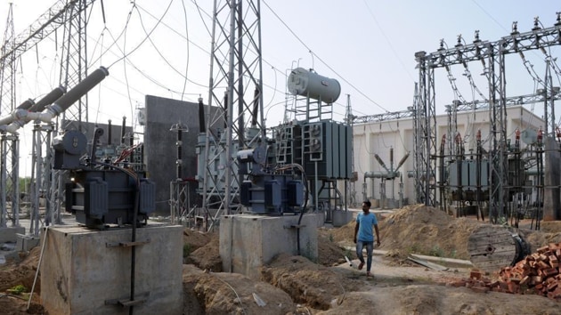 About 300 houses in C Block spent 12 hours without electricity after a blast in a 400KV transformer on April 19.(HT Photo)