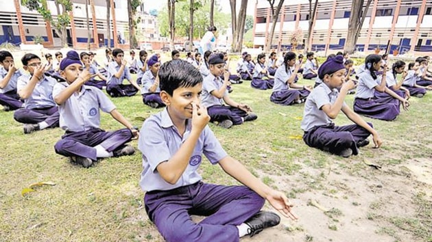 Students in government schools across the capital were involved in summer sports and yoga camps, buniyaad classes, and remedial classes for those who had compartment examinations. Buniyaad classes ends on June 6.(HT Photo)