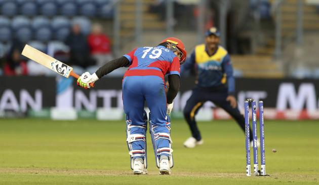 Afghanistan's Rashid Khan is bowled by Sri Lanka's Nuwan Pradeep during the Cricket World Cup group stage match between Sri Lanka and Afghanistan at the Cardiff Stadium, Wales, Tuesday June 4, 2019. (David Davies/PA via AP) (AP)