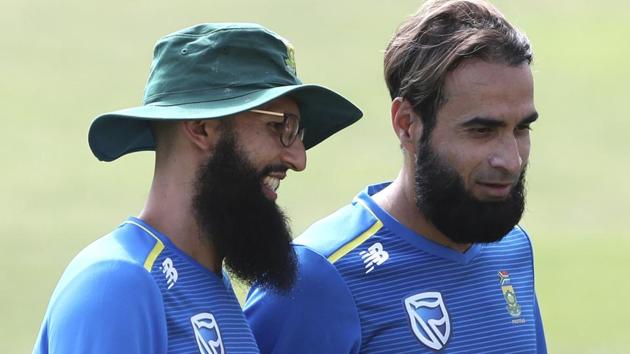 South Africa's Hashim Amla, left, and Imran Tahir attend a training session.(AP) South Africa's Hashim Amla, left, and Imran Tahir attend a training session.(AP)
