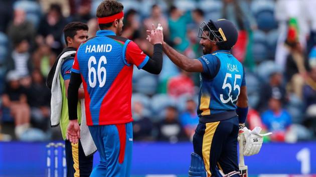 Sri Lanka's Kusal Perera and Afghanistan's Hamid Hassan during the match. (Action Images via Reuters)