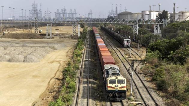 A train carrying shipping containers near the Jawaharlal Nehru Port. India said in response that it had offered resolutions to the US during bilateral trade discussions, and it’s “unfortunate” that those weren’t accepted. While India will continue to work on improving ties with the US, its trade decisions would be guided by its own “development imperatives and concerns,” the trade ministry has said in a statement. (Dhiraj Singh / Bloomberg)