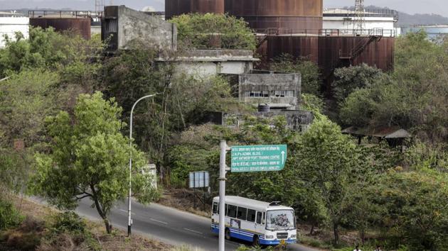 Oil tanks stand near the Jawaharlal Nehru Port. Still, earlier this week Trump removed India from its currency monitoring list of major trading partners -- it had been added to the list a year ago -- and Secretary of State Michael Pompeo termed the country a “great ally.” A March notice gave India two months to address the administration’s concerns before Trump made the end to the tariff treatment official. (Dhiraj Singh / Bloomberg)