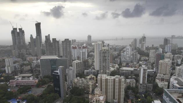 The residents, however, are wary of vacating the buildings out of fear that they may not be able to move back to south Mumbai, and also that the transit camps are located in Gorai.(HT Photo)