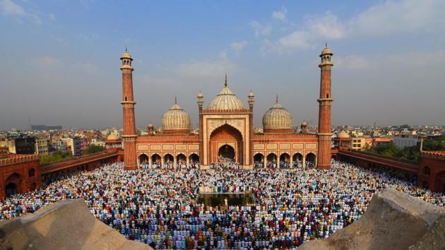 Thousands of devotees offer prayers on the occasion of Eid-ul-Fitr, at Jama Masjid, in New Delhi. The festival, which marks the end of the holy month of Ramzan, was celebrated in different parts of the country. (Amal KS / HT Photo)